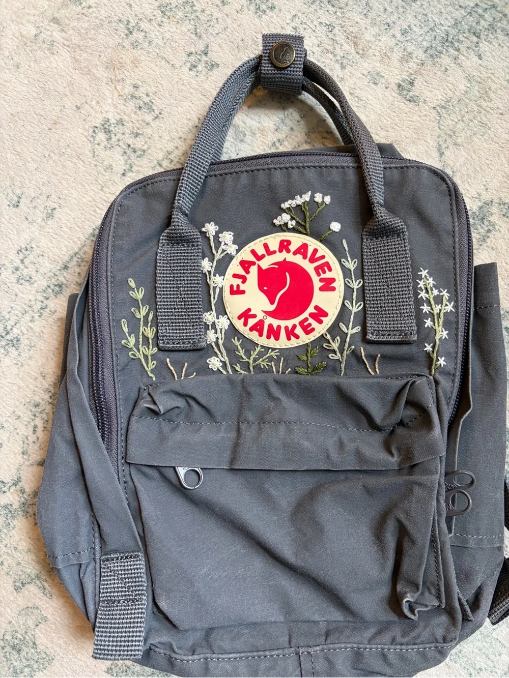 Kånken Black Mini Backpack with Floral Embroidery